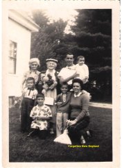 This photograph shows my great-grandmother's sister Olivia (far left, in rear) with her two grandsons in front of her.  My great-grandmother, Augusta, next to her, in rear, appears with her youngest son William, wife Bernadette, and their two children, 1958.